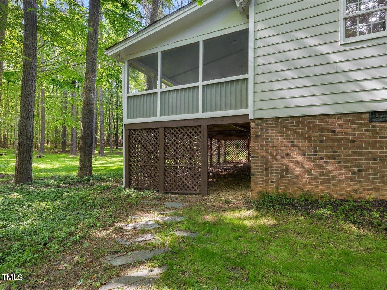 10609 Chinkapin Place Raleigh, NC 27613 - Photo 61 of 78 61-Side Path