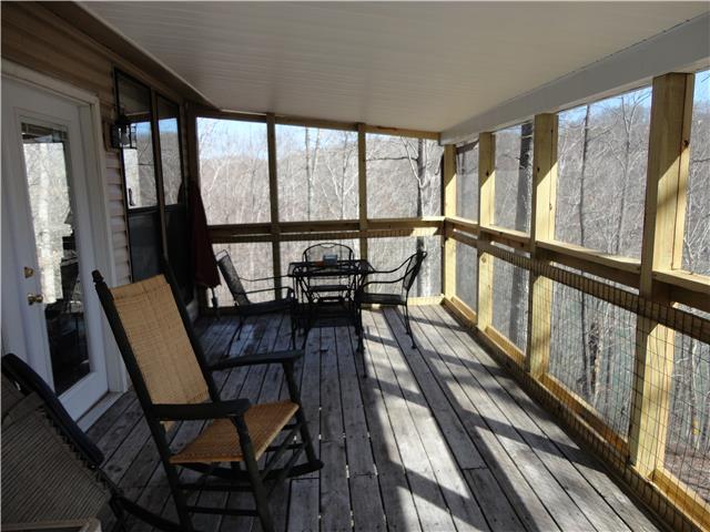 739 Aaron Webb Road Smithville, TN 37166 - Photo 11 of 15 Large screened deck is 210 sq. ft.