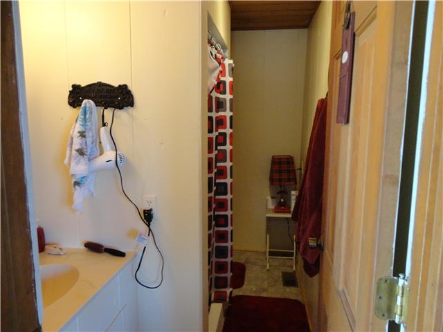 739 Aaron Webb Road Smithville, TN 37166 - Photo 8 of 15 Bathroom is downstairs and has shower only.