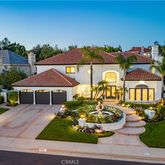 an outdoor space with furniture and garden