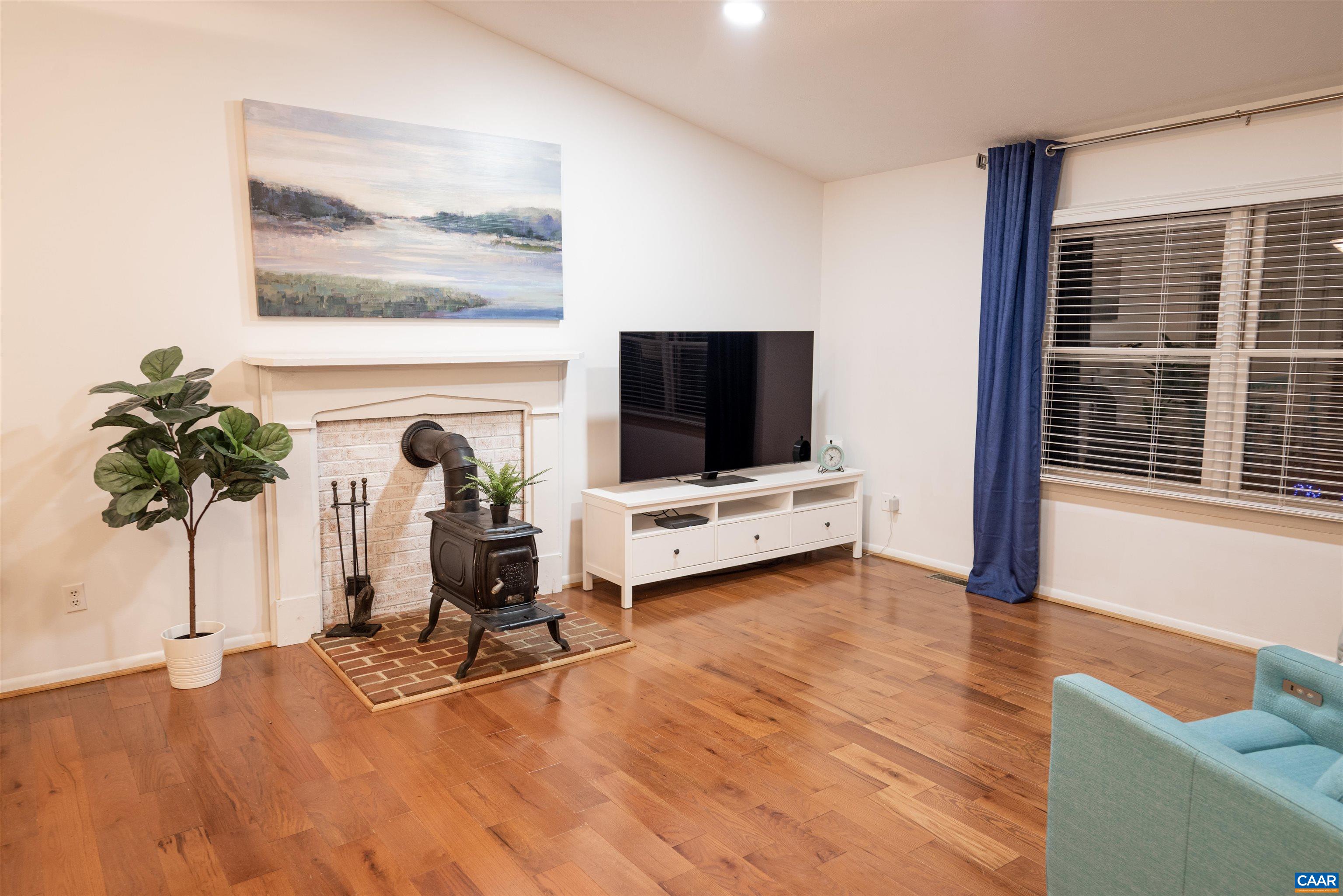 21 Rowell Road Palmyra, VA 22963 - Photo 15 of 30 a living room with furniture and a flat screen tv