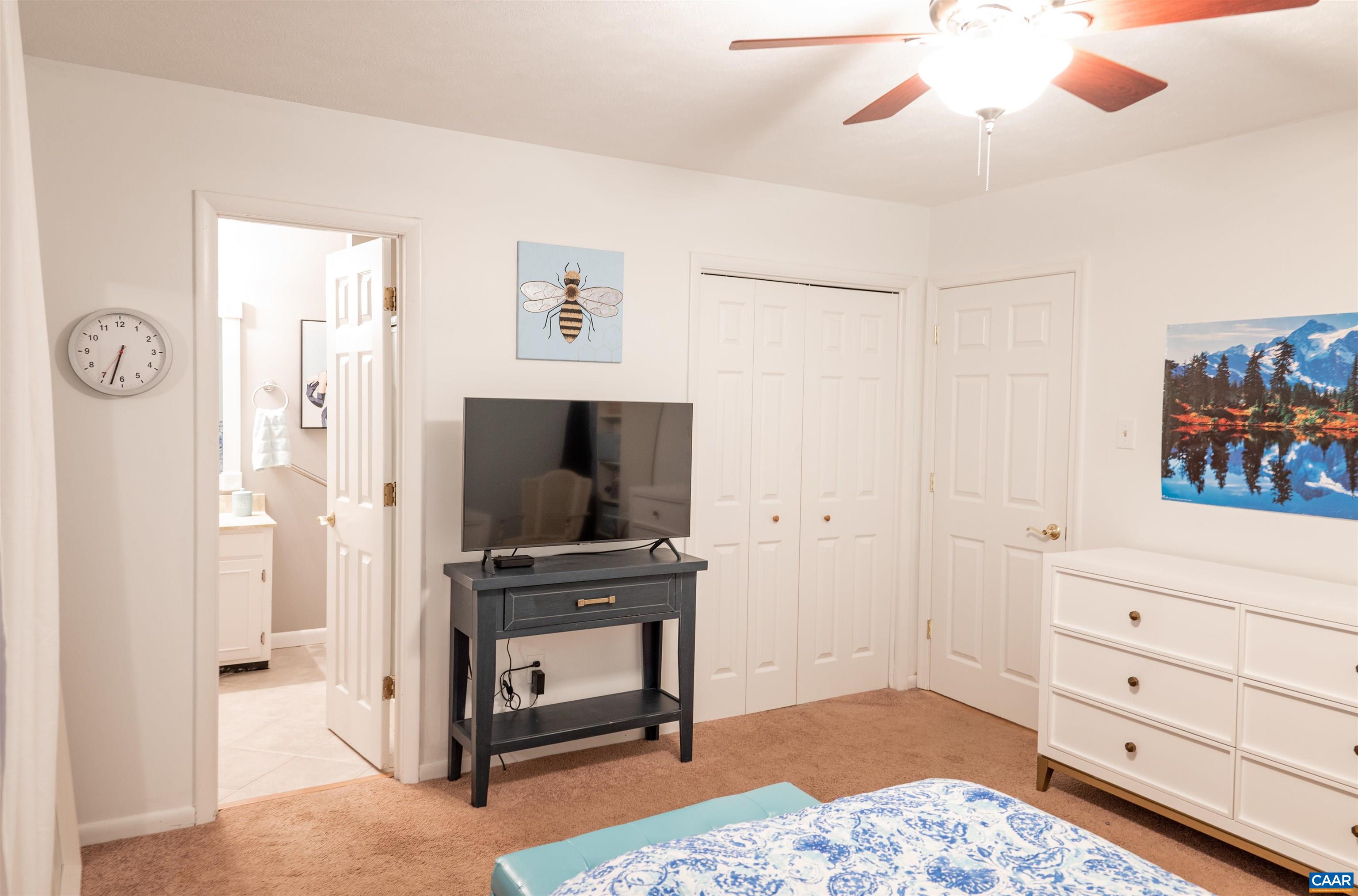 21 Rowell Road Palmyra, VA 22963 - Photo 19 of 30 a living room with furniture and a flat screen tv