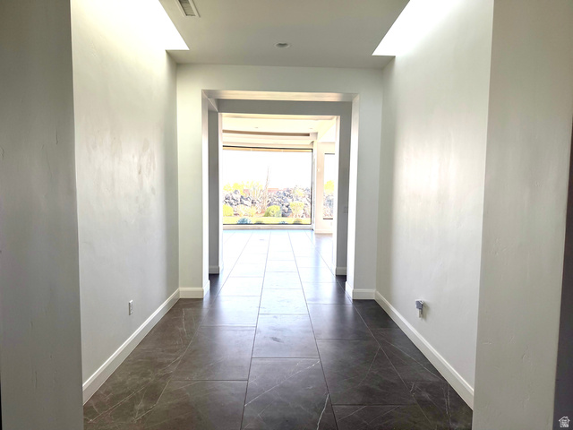 1500 Split Rock, Unit 150 Ivins, UT 84738 - Photo 17 of 18 Entryway featuring large format tile flooring and white baseboards