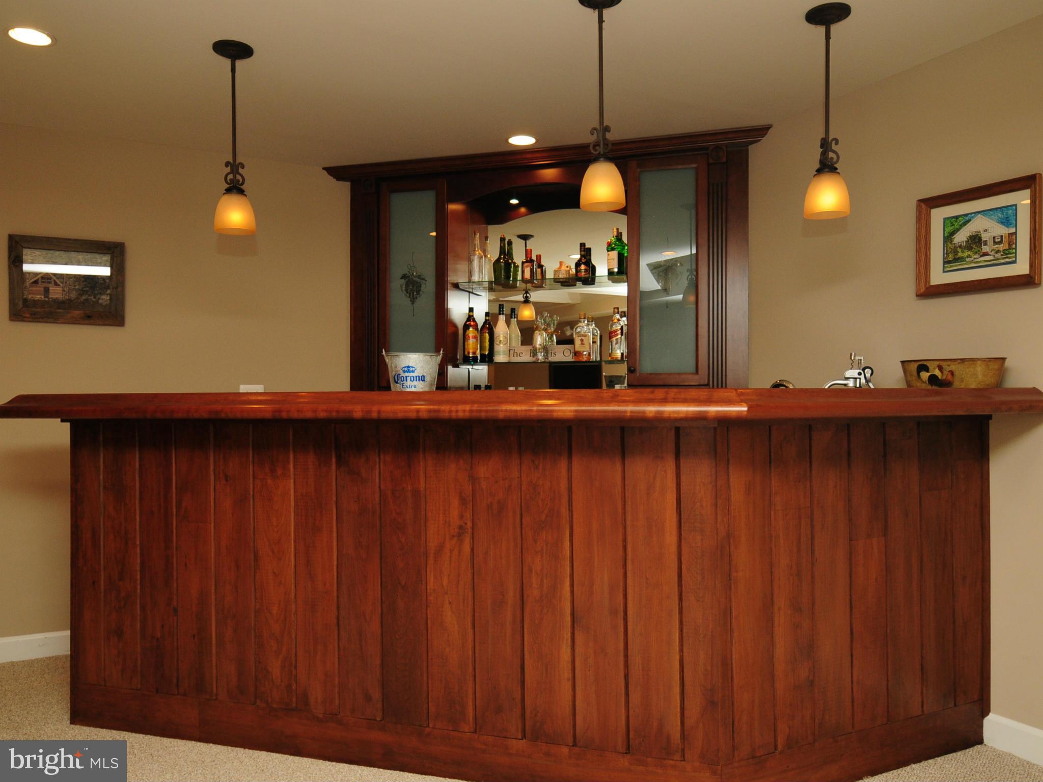 39670 Mt Gilead Road Leesburg, VA 20175 - Photo 22 of 30 Wet bar in rec room ; sink, beverage fridge