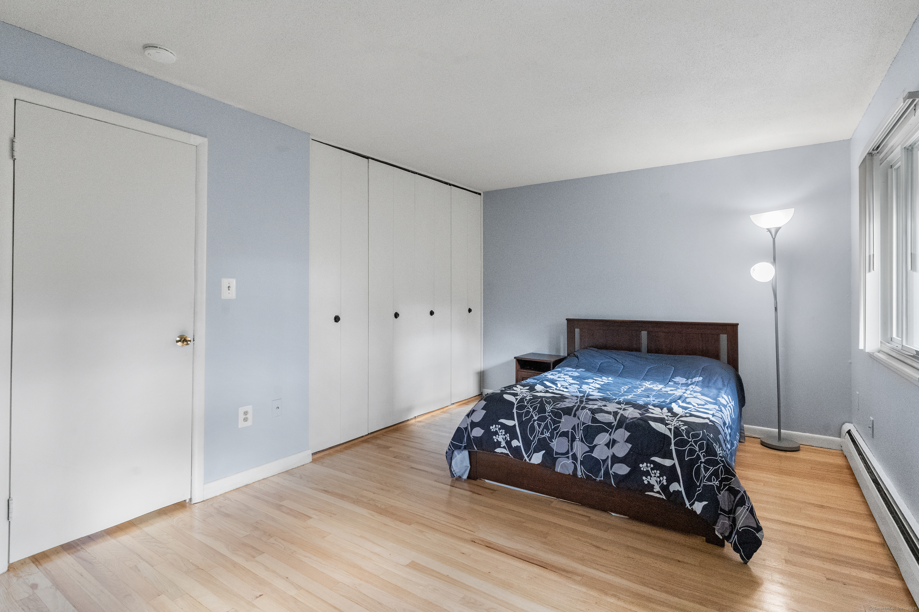 248 Centerbrook Road Hamden, CT 06518 - Photo 14 of 30 a bedroom with a bed and a night stand