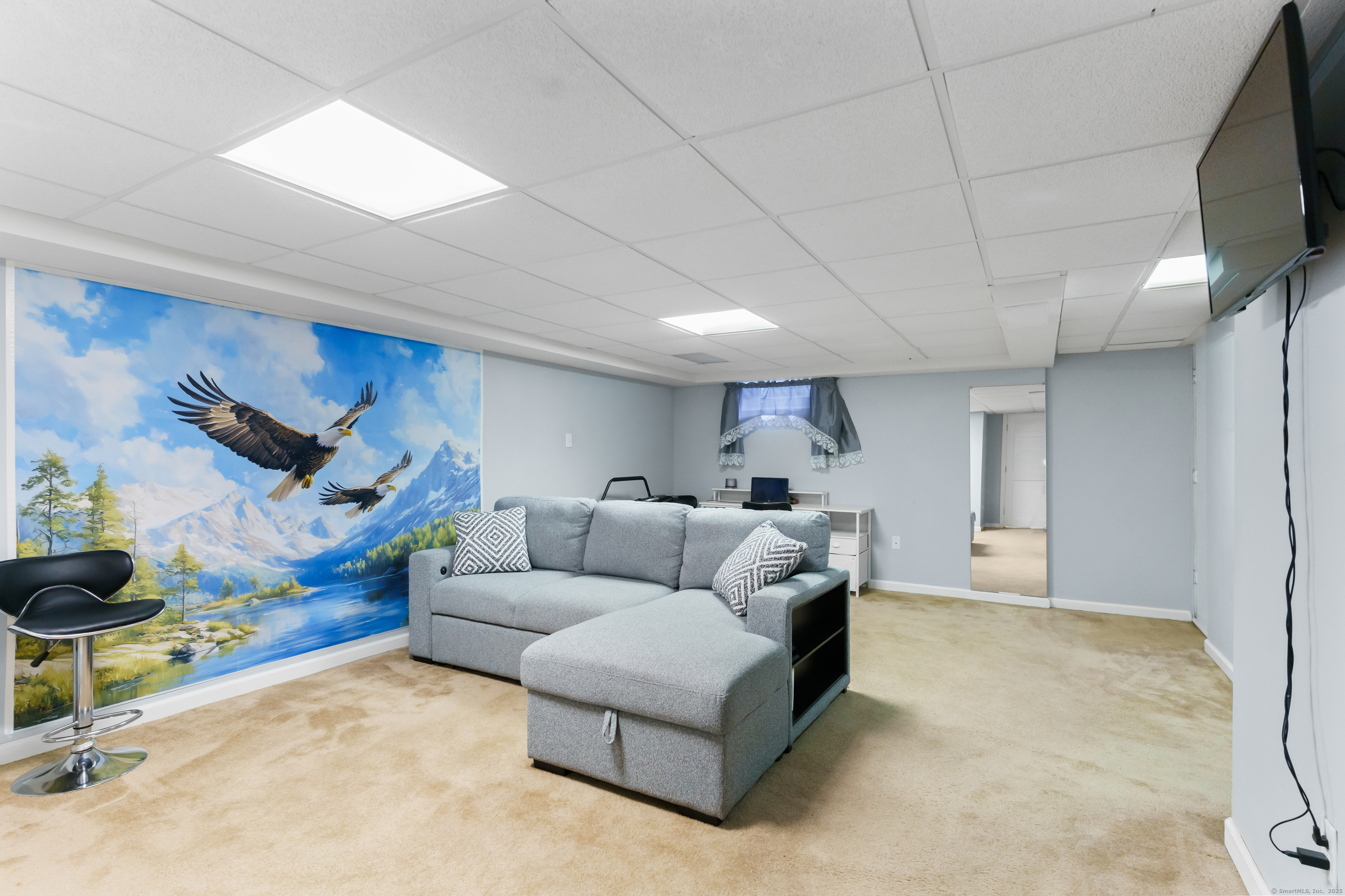 248 Centerbrook Road Hamden, CT 06518 - Photo 19 of 30 a living room with furniture and a flat screen tv