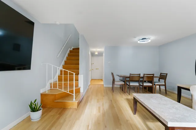 a living room with furniture and a table