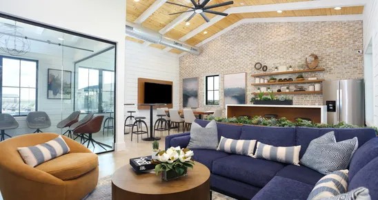 162 Hayloft Lane Elgin, TX 78621 - Photo 17 of 26 a living room with furniture and a flat screen tv