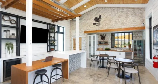 162 Hayloft Lane Elgin, TX 78621 - Photo 18 of 26 a dining hall with furniture and large windows