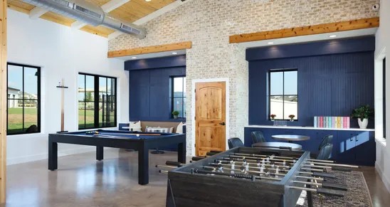 162 Hayloft Lane Elgin, TX 78621 - Photo 19 of 26 a living room with furniture and a fireplace