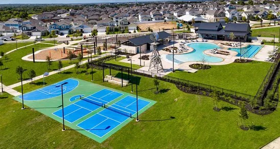 162 Hayloft Lane Elgin, TX 78621 - Photo 23 of 26 an aerial view of a pool patio swimming pool and outdoor seating