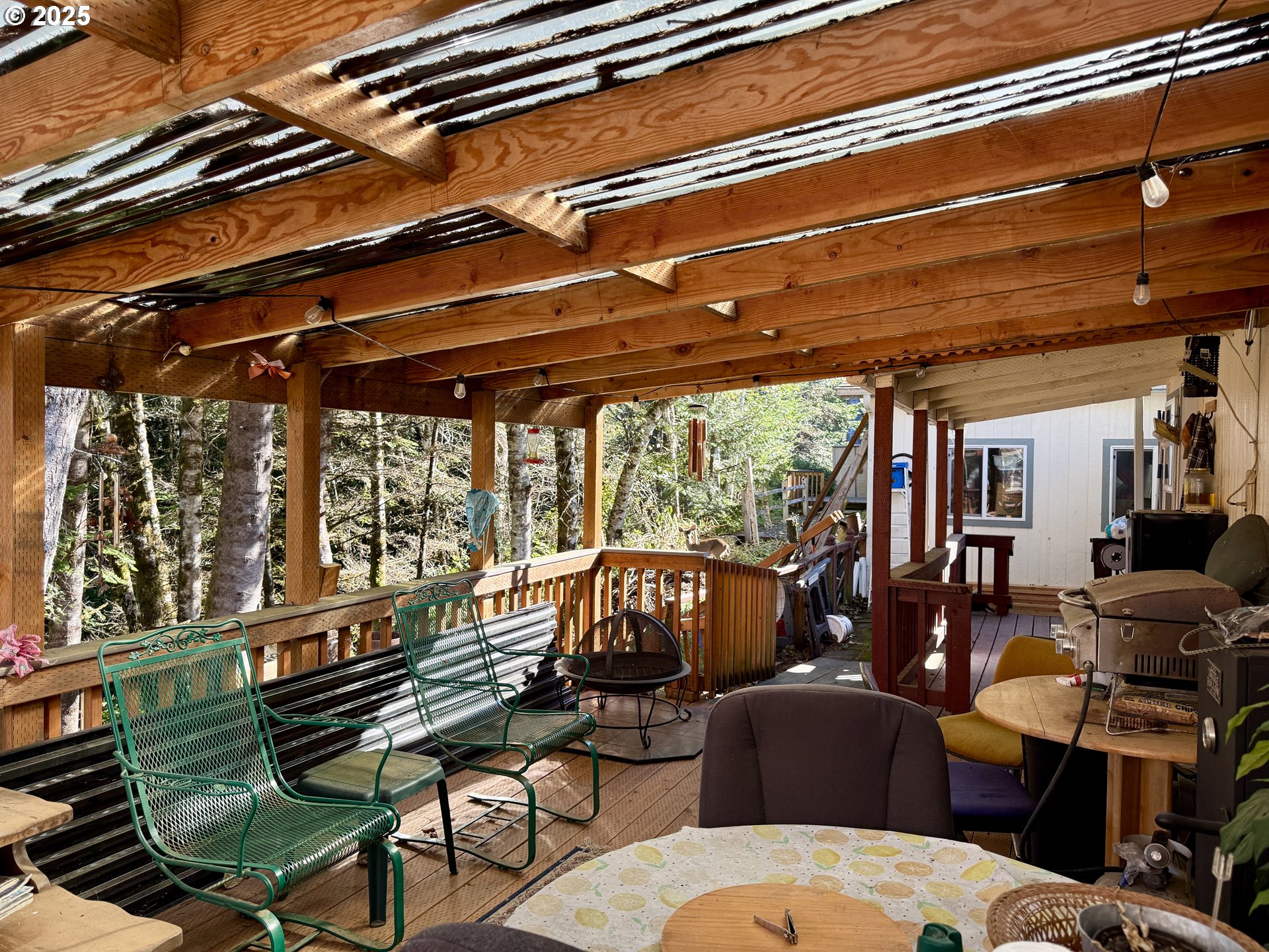 1305 Kristi Loop Lakeside, OR 97449 - Photo 24 of 25 a building outdoor space with patio furniture