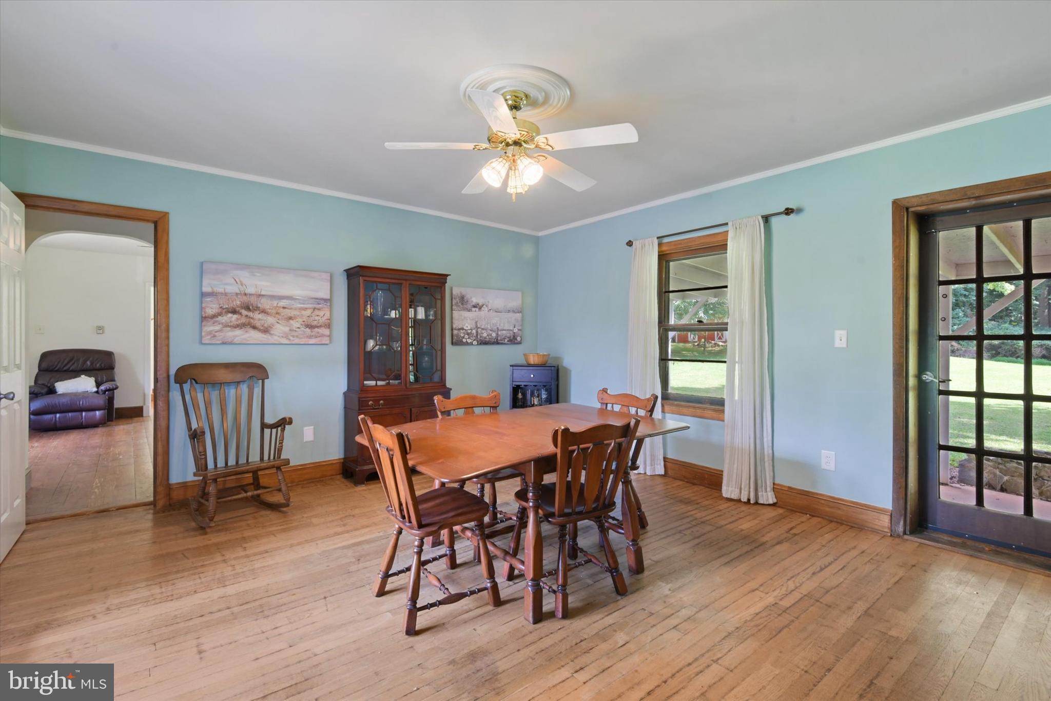6953 Linganore Road Frederick, MD 21701 - Photo 12 of 42 Dining Room opens to front & rear yards.