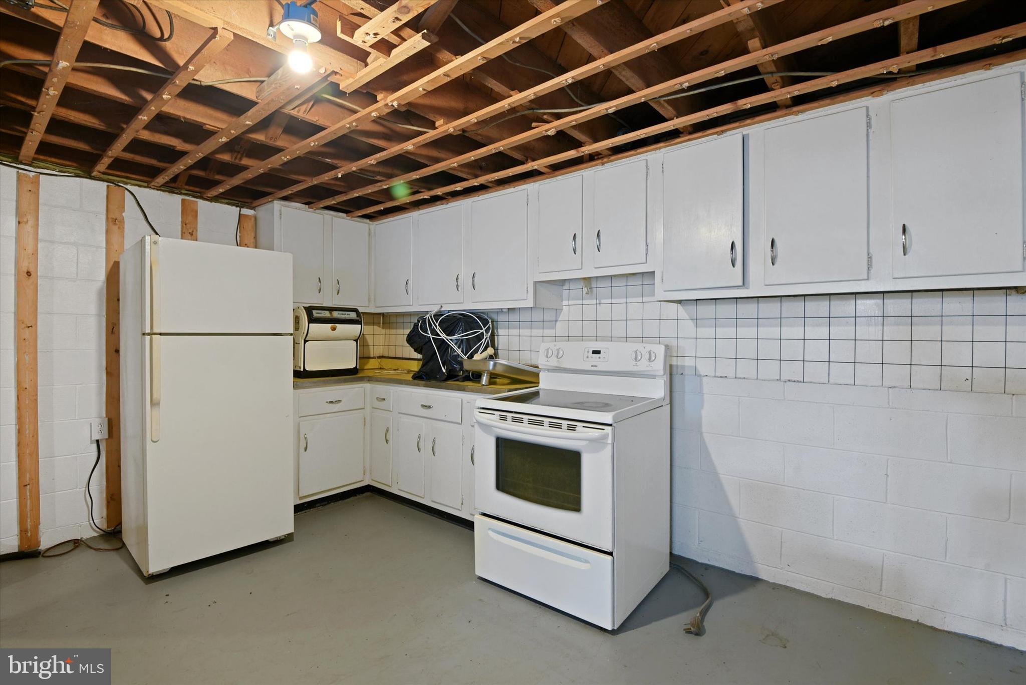 6953 Linganore Road Frederick, MD 21701 - Photo 33 of 42 Kitchen space in basement.