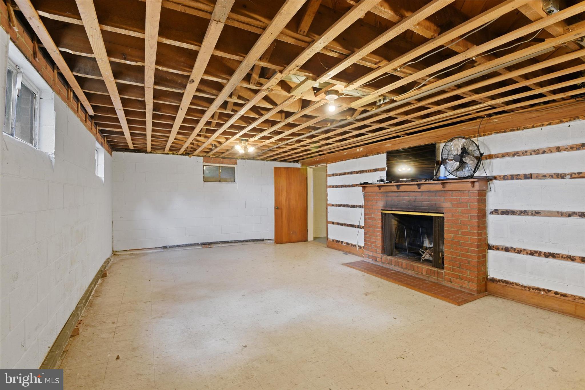 6953 Linganore Road Frederick, MD 21701 - Photo 36 of 42 Basement w/ FP.