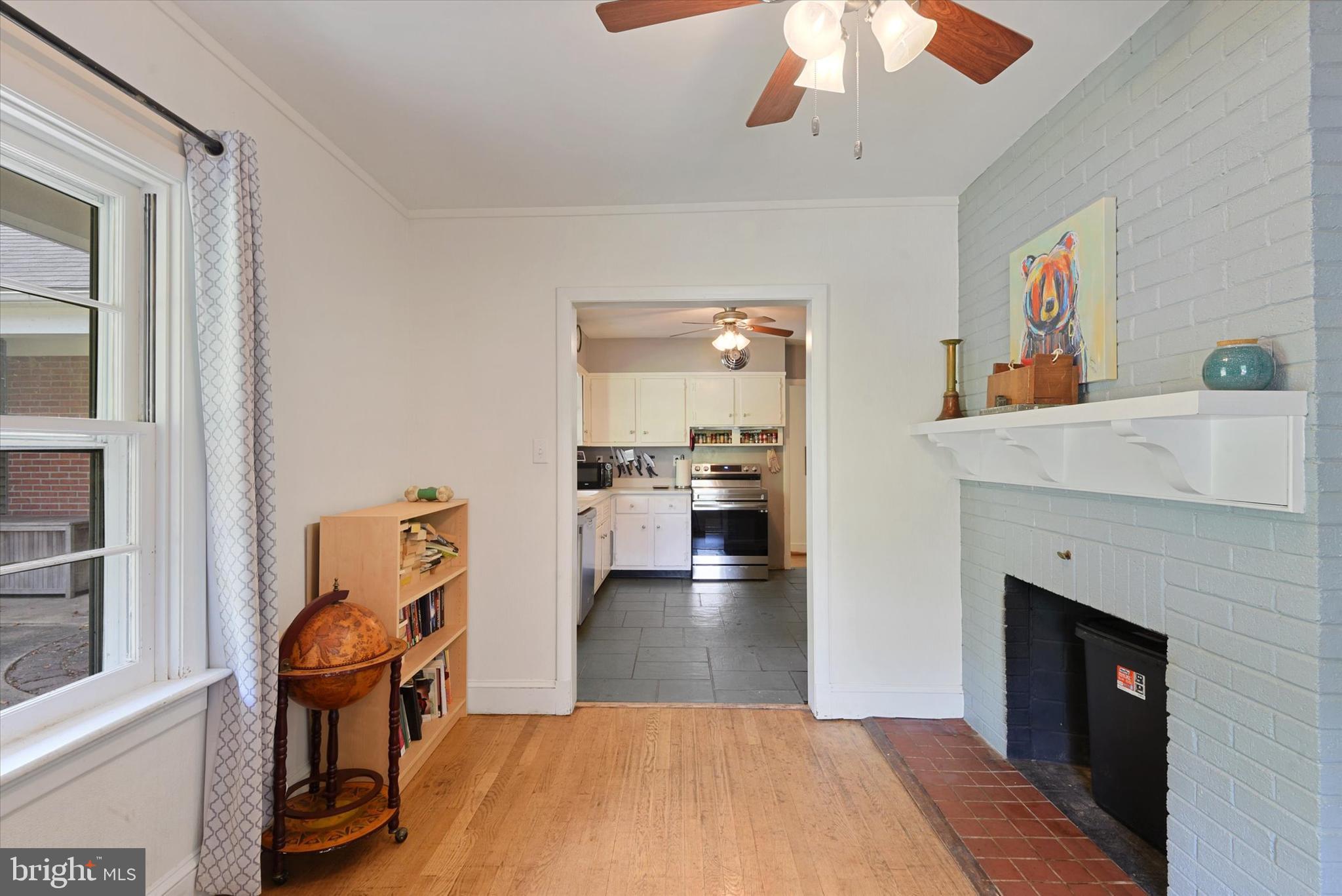 6953 Linganore Road Frederick, MD 21701 - Photo 6 of 42 Bonus room situated between kitchen & living room.