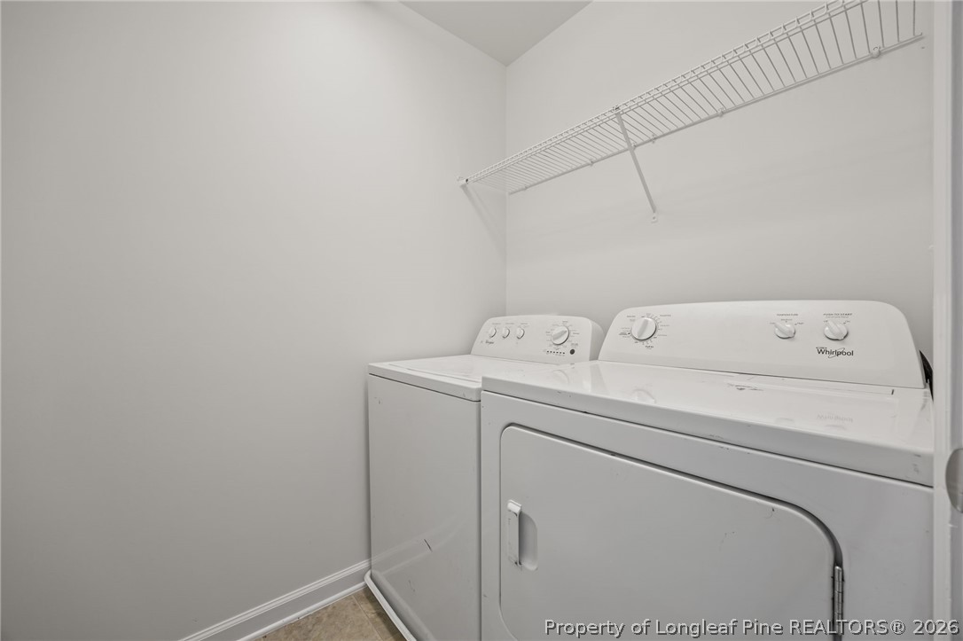 226 River Oak Street Spring Lake, NC 28390 - Photo 36 of 41 a utility room with dryer and washer