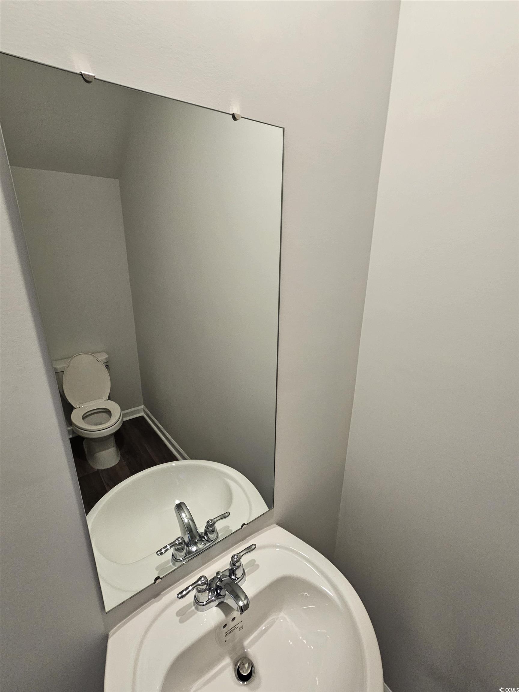 800 Wapama Street Little River, SC 29566 - Photo 11 of 34 Bathroom featuring a sink and toilet