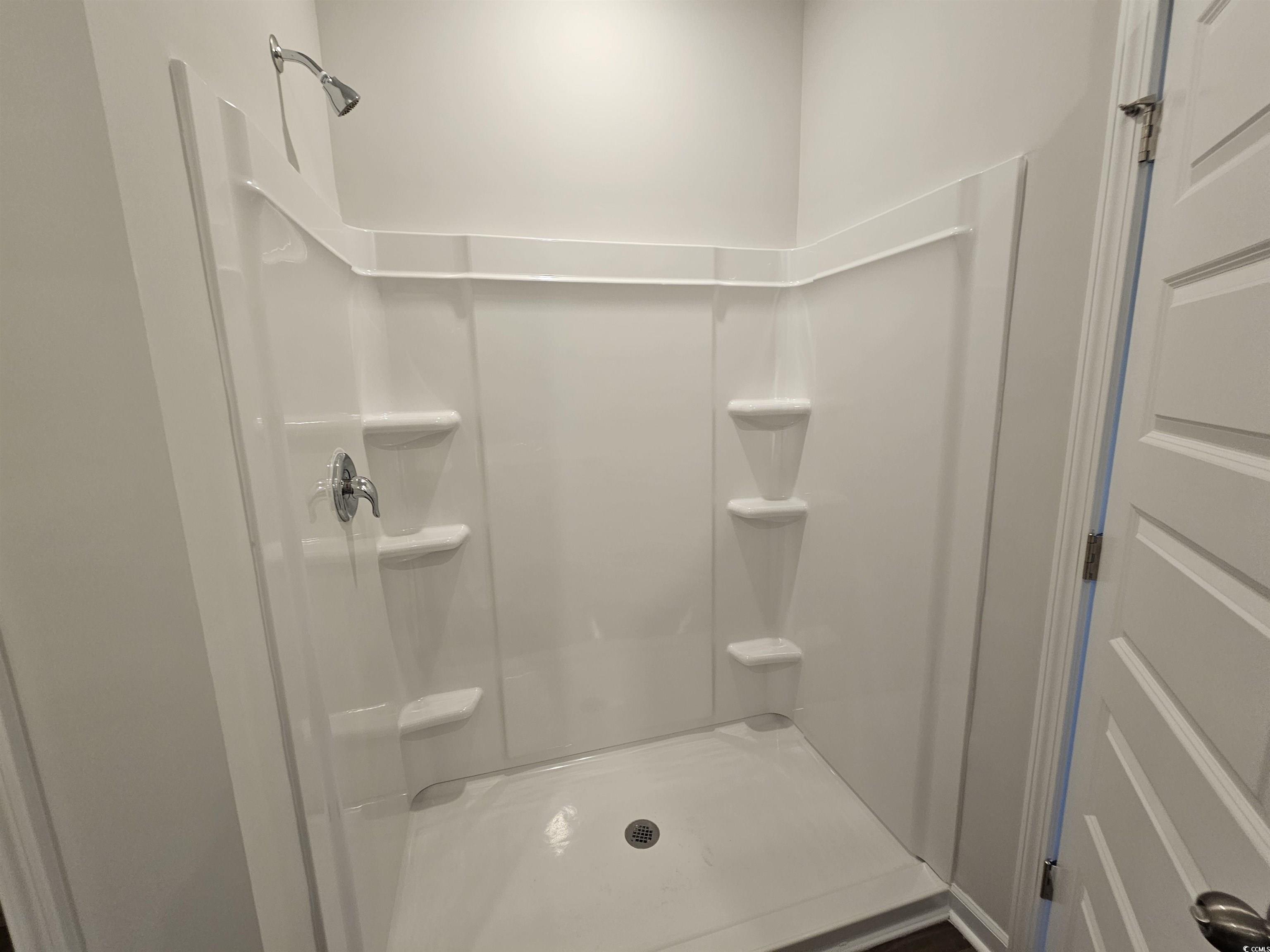 800 Wapama Street Little River, SC 29566 - Photo 15 of 34 Bathroom with a stall shower