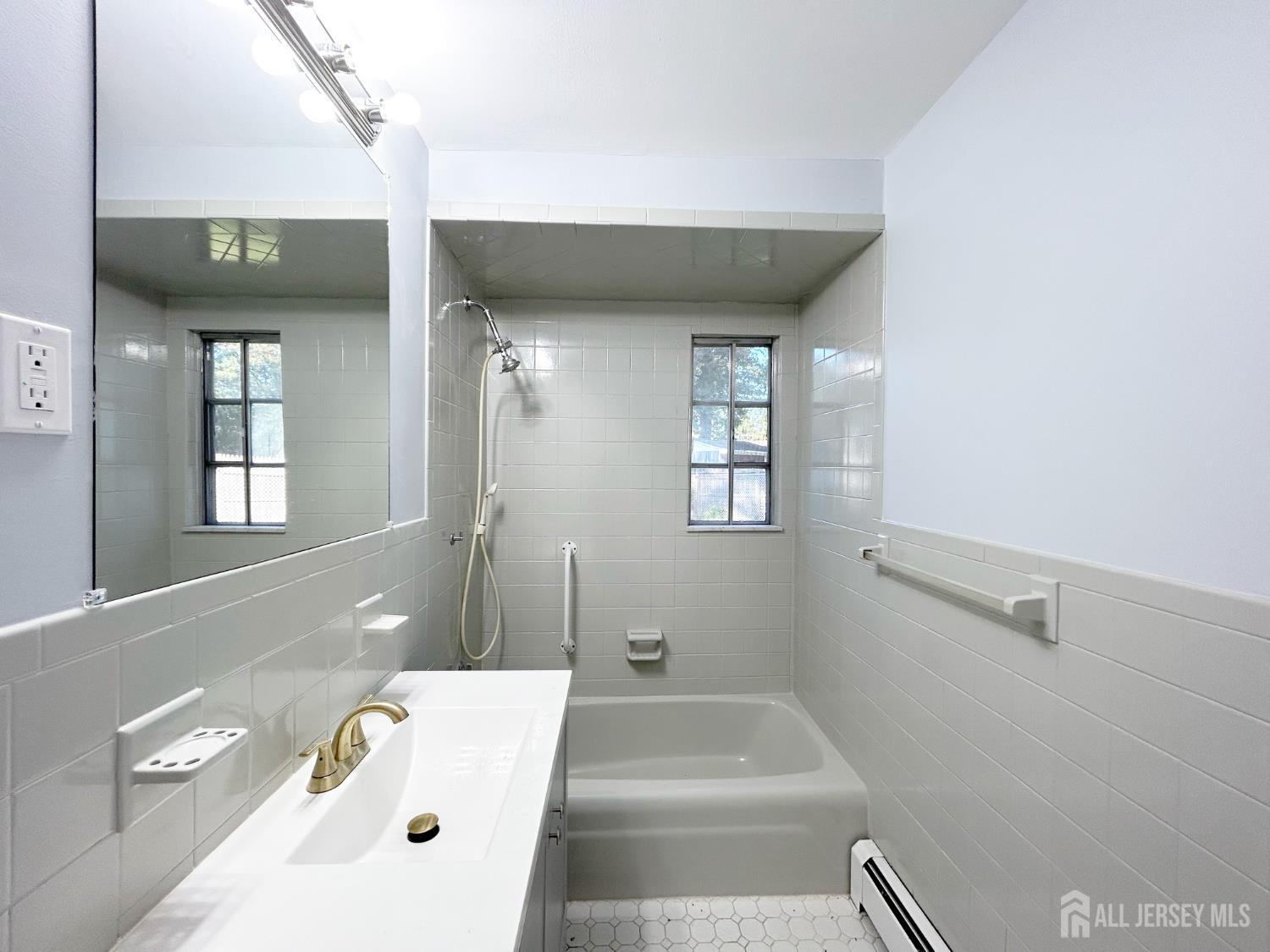 3 Stiles Road Edison, NJ 08817 - Photo 13 of 21 a bathroom with a bathtub