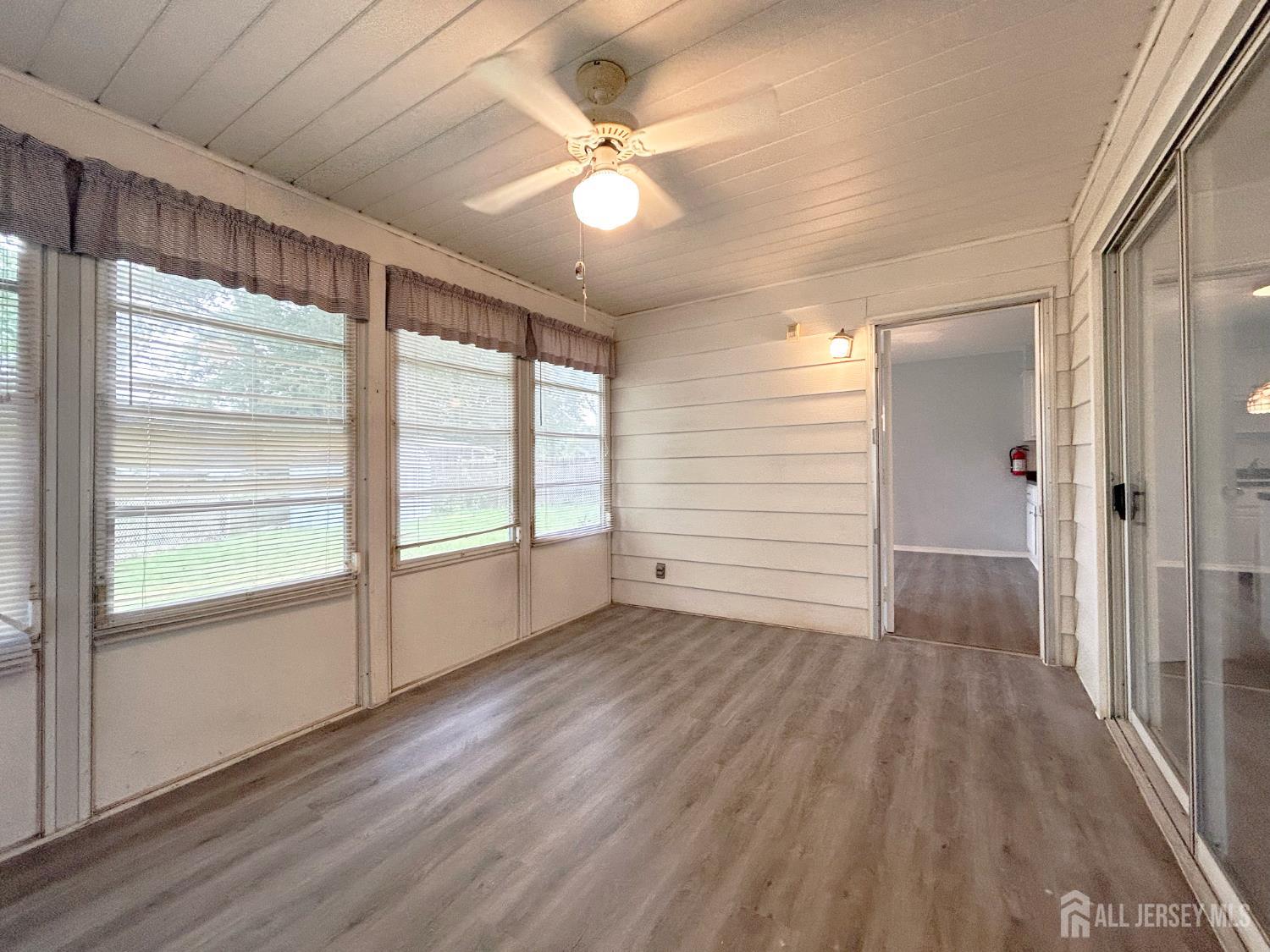 3 Stiles Road Edison, NJ 08817 - Photo 21 of 21 wooden floor in an empty room with a window