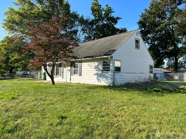 a view of a backyard with a garden