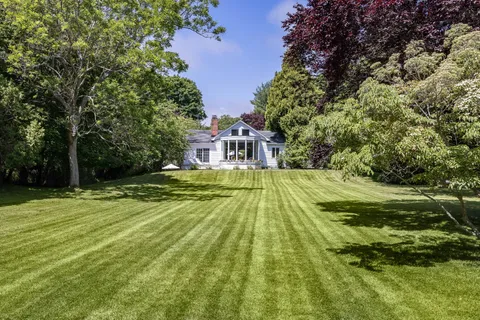 a view of a house with a big yard
