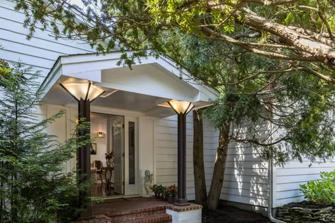 a balcony view with a outdoor seating space