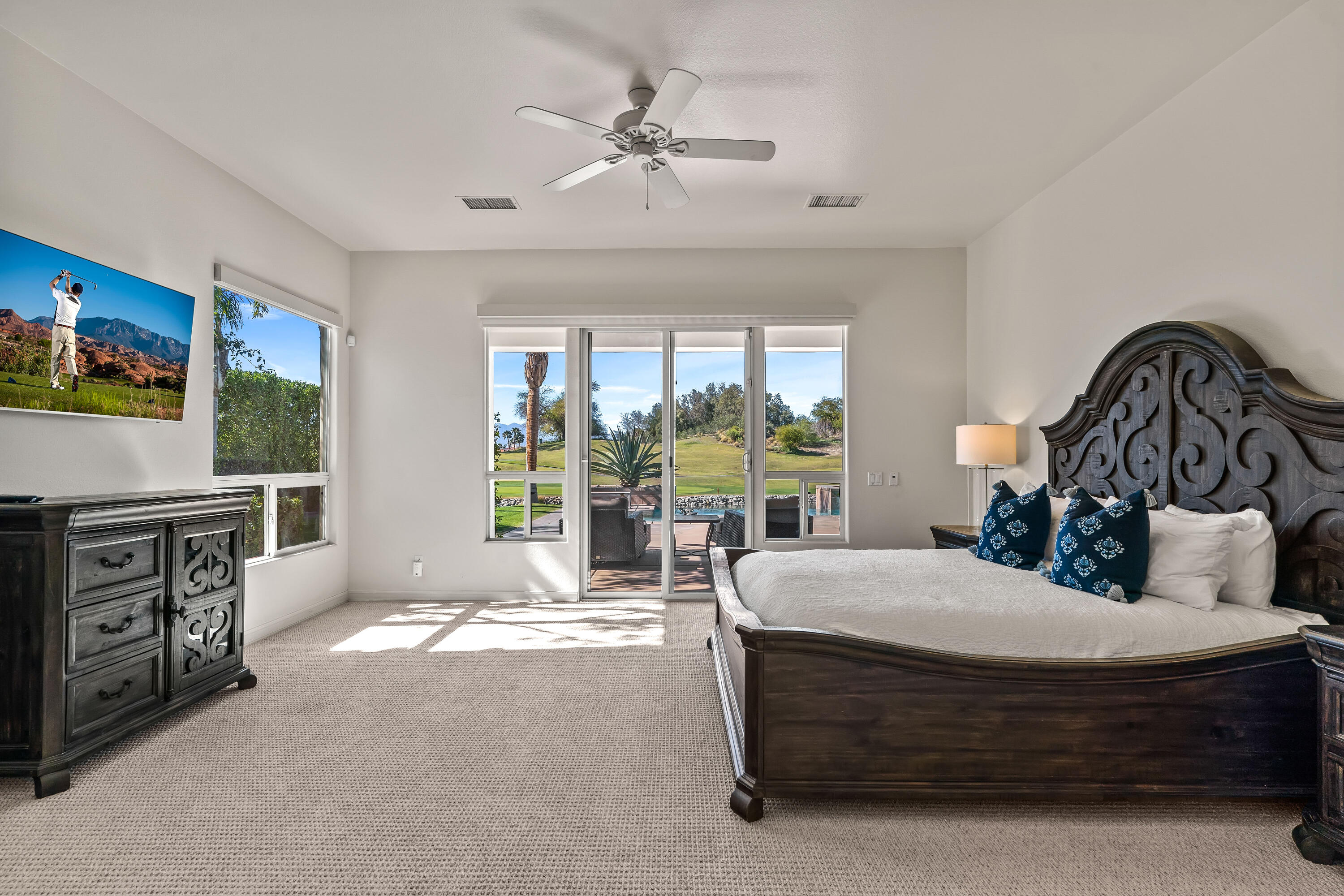 362 Loch Lomond Road Rancho Mirage, CA 92270 - Photo 23 of 26 a bed room with a bed and a television