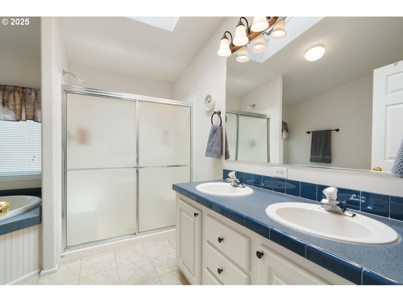 12844 Southwest Upper Ridge Terrebonne, OR 97760 - Photo 12 of 25 a bathroom with a sink double vanity and a mirror