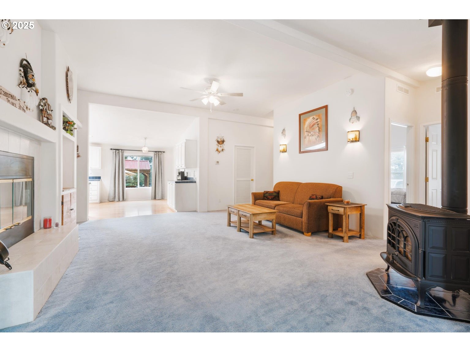 12844 Southwest Upper Ridge Terrebonne, OR 97760 - Photo 5 of 25 a living room with furniture and a flat screen tv