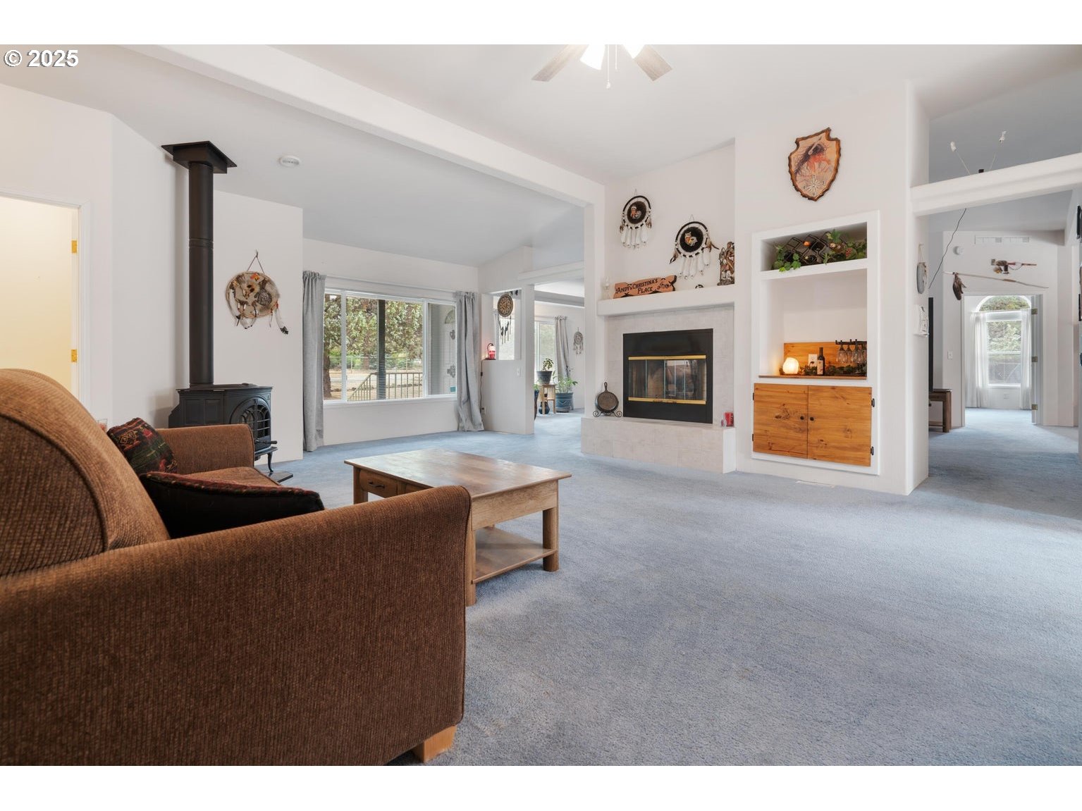 12844 Southwest Upper Ridge Terrebonne, OR 97760 - Photo 6 of 25 a living room with furniture and a fireplace