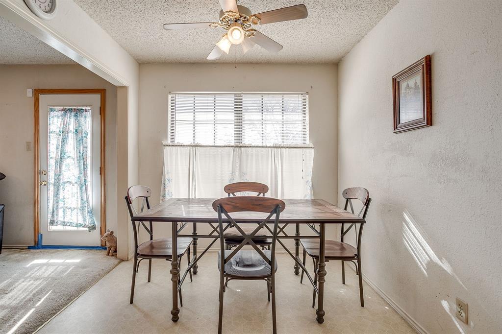 3019 Sunrise Trail Weatherford, TX 76088 - Photo 11 of 40 a view of a dining room with furniture and window