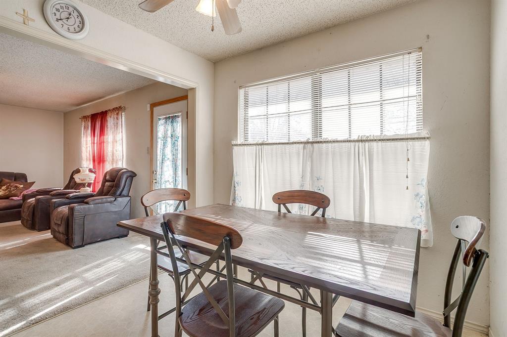3019 Sunrise Trail Weatherford, TX 76088 - Photo 12 of 40 a view of a dining room with furniture window and outside view