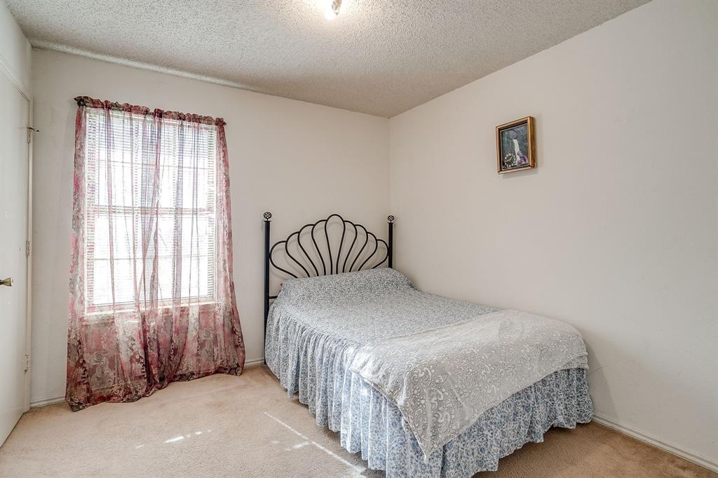 3019 Sunrise Trail Weatherford, TX 76088 - Photo 20 of 40 a bedroom with a bed and a window