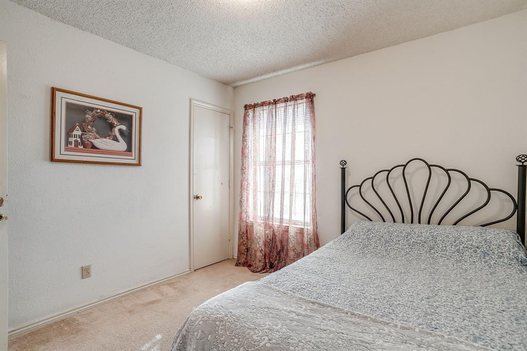 3019 Sunrise Trail Weatherford, TX 76088 - Photo 21 of 40 a bedroom with a bed and a window