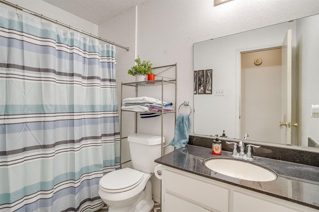 3019 Sunrise Trail Weatherford, TX 76088 - Photo 25 of 40 a bathroom with a sink toilet and shower
