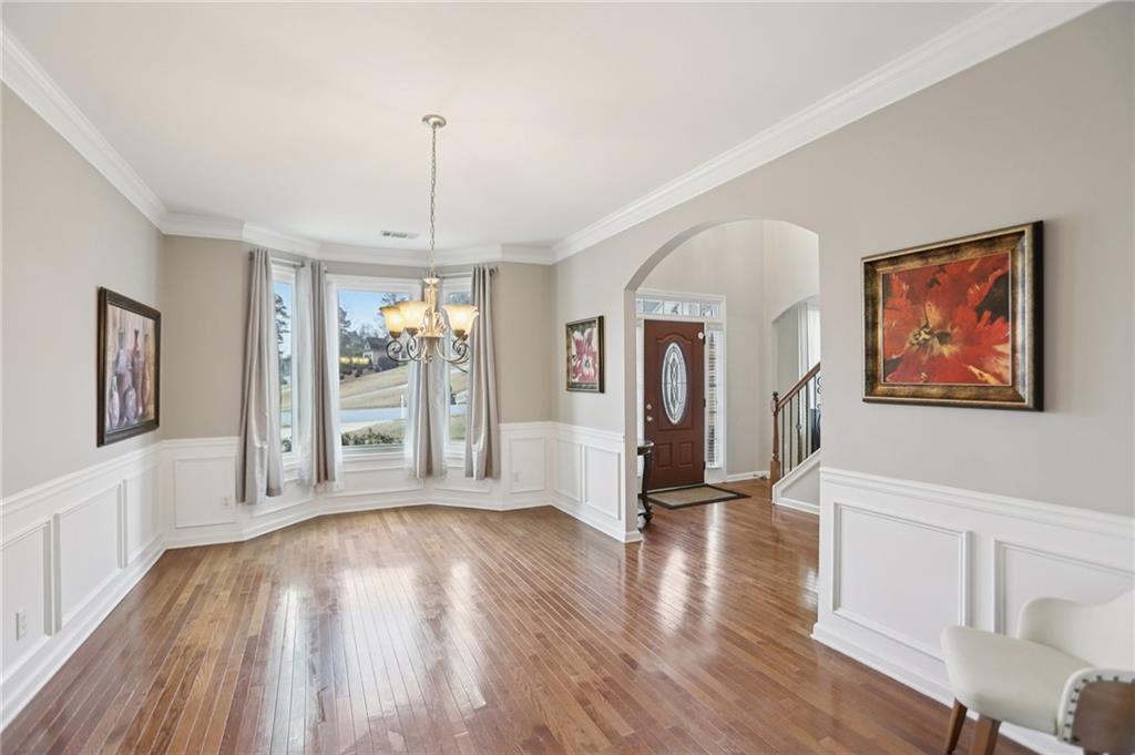 419 Long Shore Way Newnan, GA 30265 - Photo 11 of 29 a view of livingroom with furniture wooden floor and window