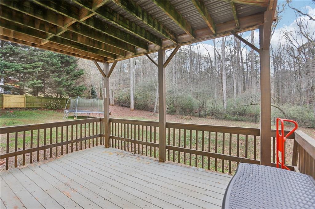 419 Long Shore Way Newnan, GA 30265 - Photo 13 of 29 a view of a wooden deck