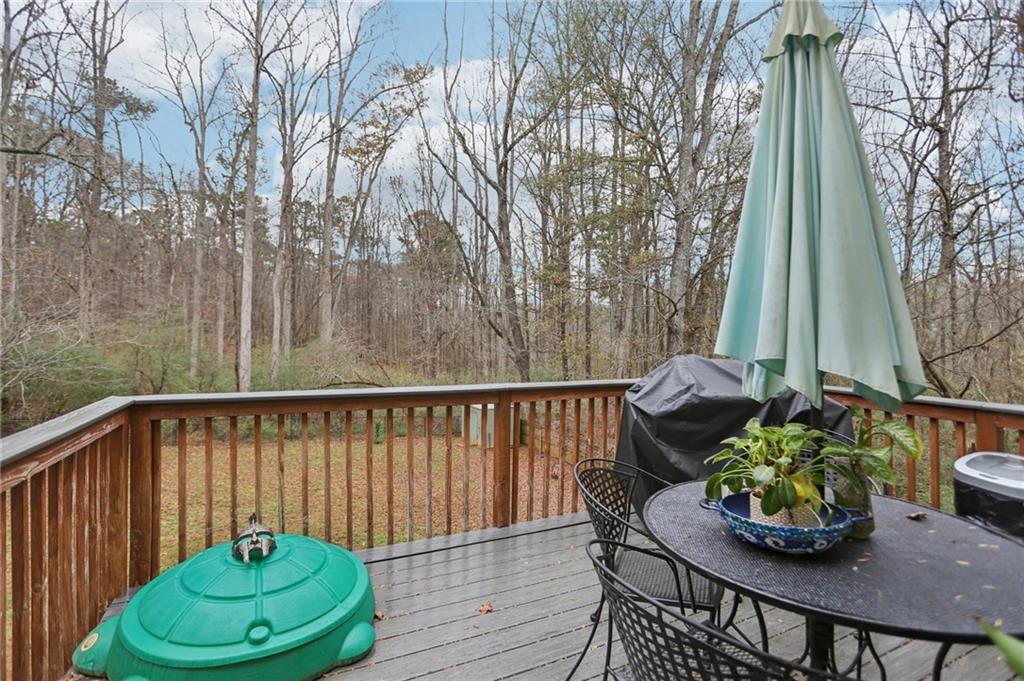 419 Long Shore Way Newnan, GA 30265 - Photo 14 of 29 a view of a chair and table in the patio