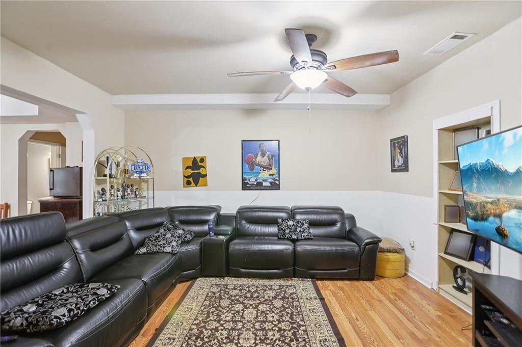 419 Long Shore Way Newnan, GA 30265 - Photo 20 of 29 a bedroom with furniture and wooden floor