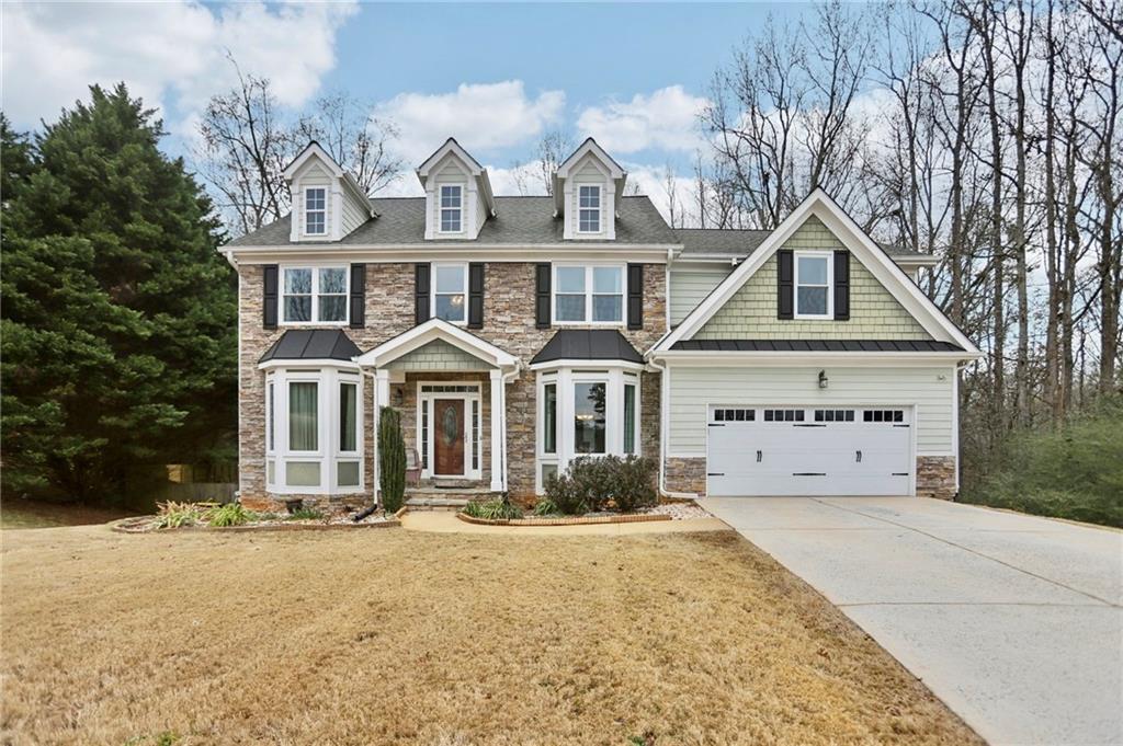419 Long Shore Way Newnan, GA 30265 - Photo 3 of 29 front view of a house with a yard