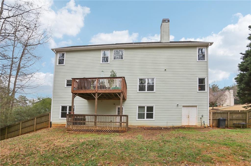 419 Long Shore Way Newnan, GA 30265 - Photo 5 of 29 a view of a house with a yard