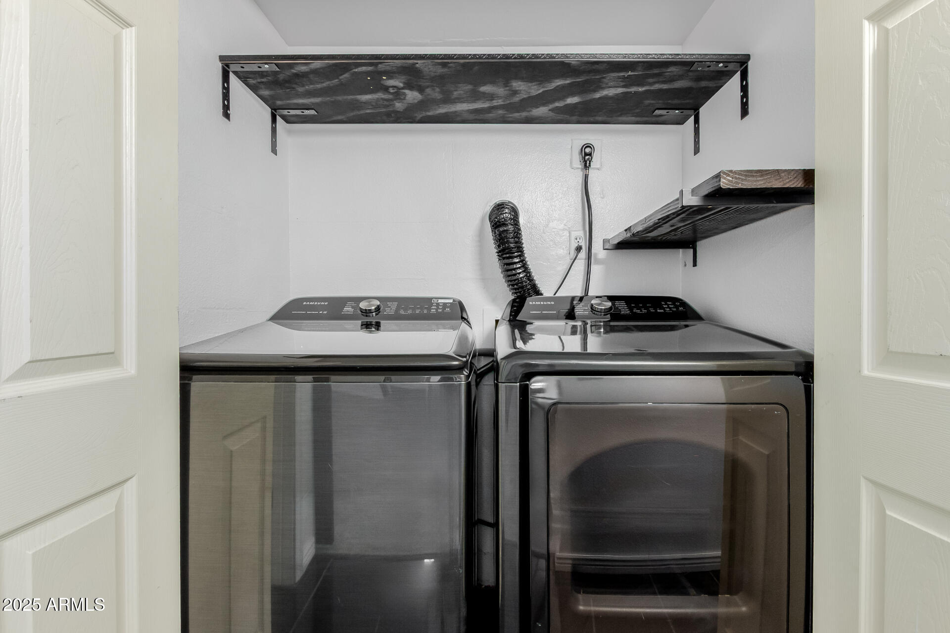 2625 East Indian School Road, Unit 238 Phoenix, AZ 85016 - Photo 16 of 29 a utility room with dryer and washer