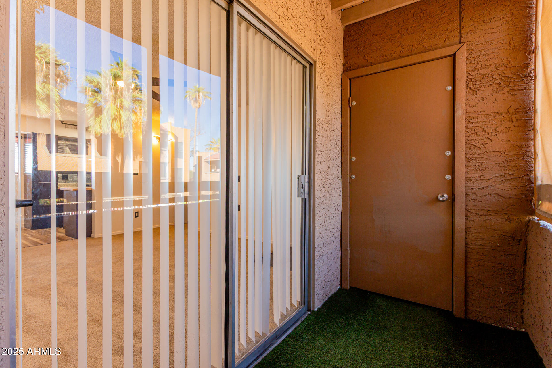 2625 East Indian School Road, Unit 238 Phoenix, AZ 85016 - Photo 17 of 29 a view of a porch with a door