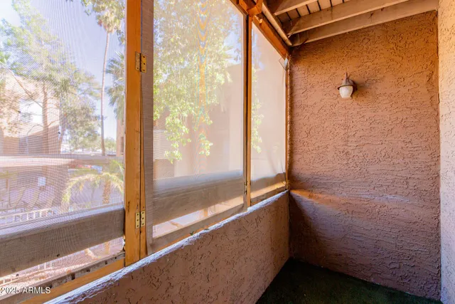 a view of a bathroom with a glass door
