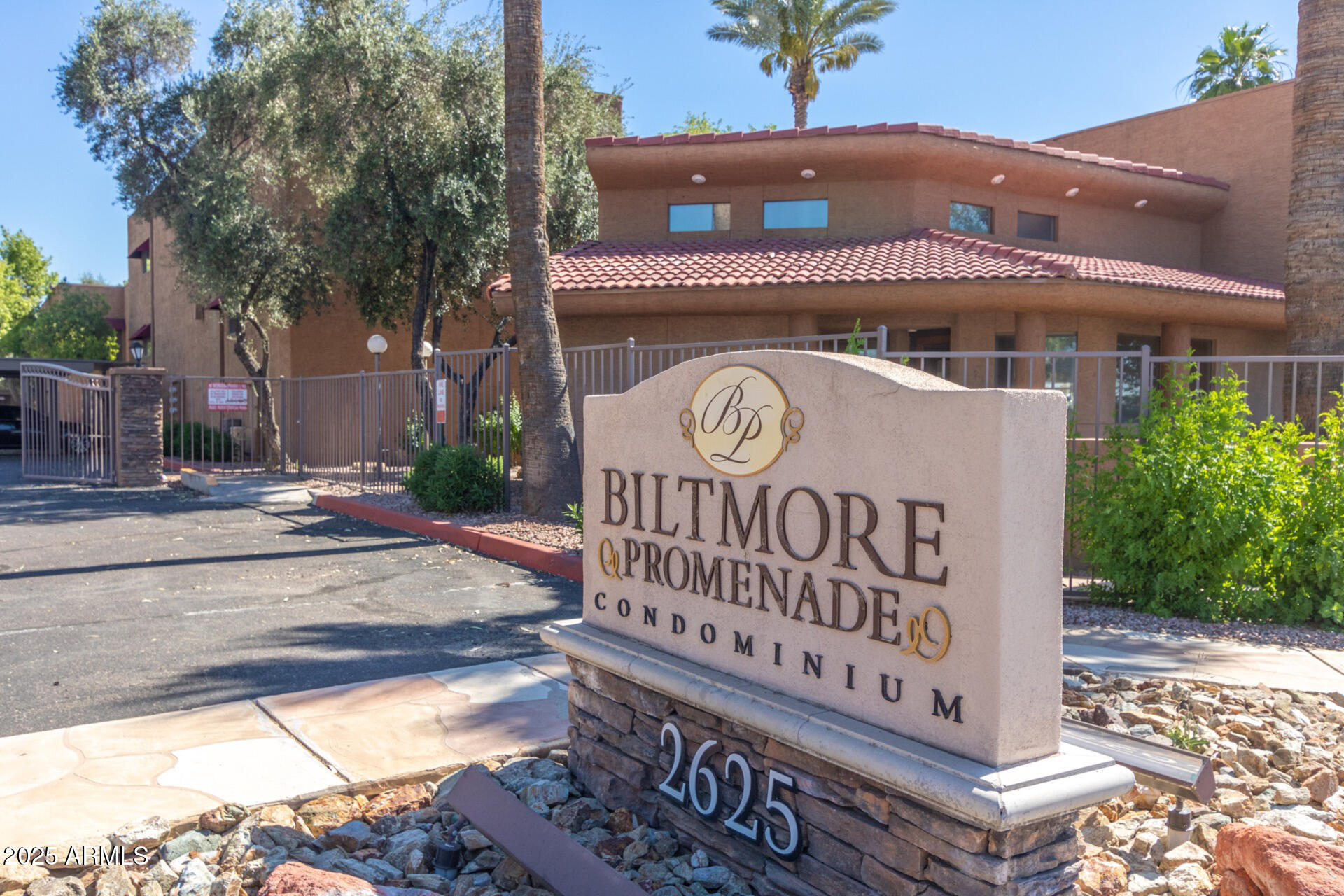 2625 East Indian School Road, Unit 238 Phoenix, AZ 85016 - Photo 20 of 29 a sign on the side of a building