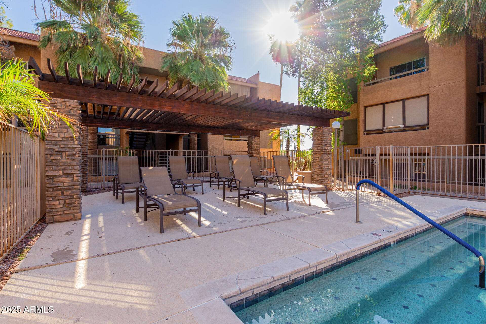 2625 East Indian School Road, Unit 238 Phoenix, AZ 85016 - Photo 24 of 29 a view of a patio with table and chairs and potted plants