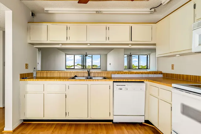 a view of a room that has a large window