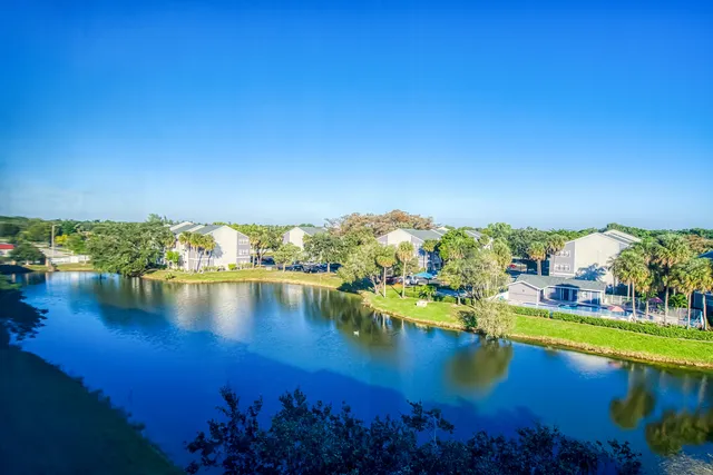 a view of a swimming pool and lake view